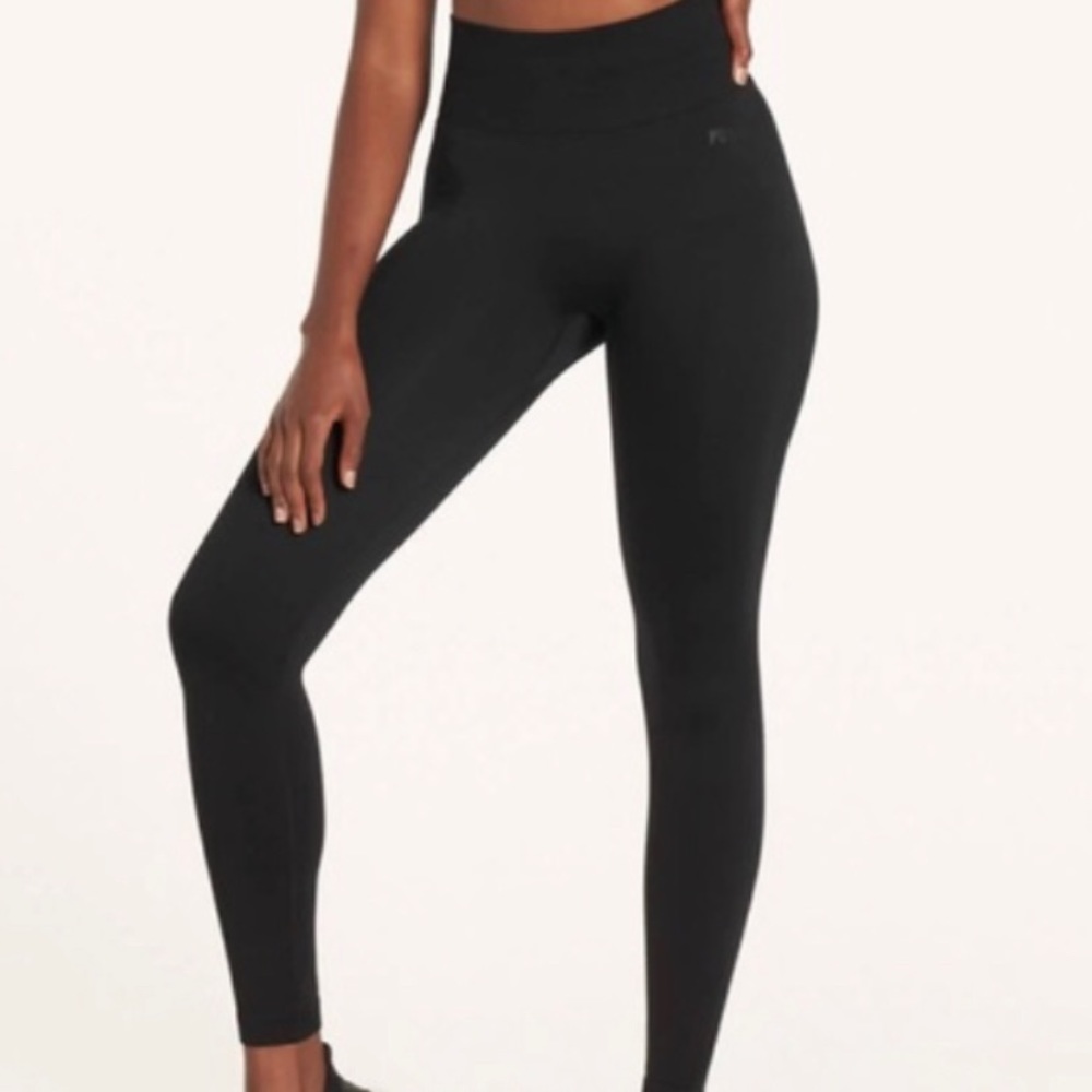 Hope Scope x Pursue Fitness black leggings.
